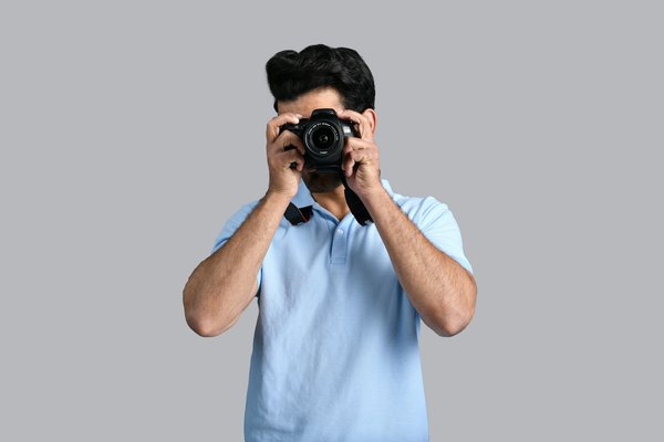 a man holding a camera